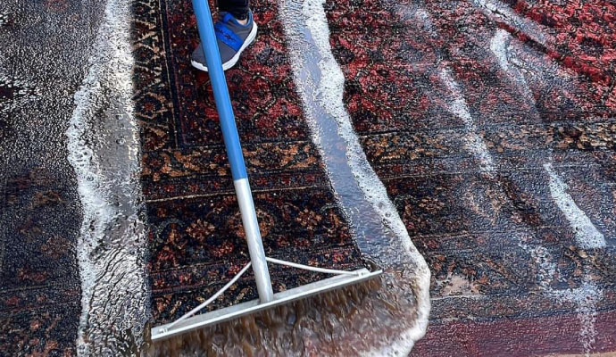 Rug cleaning using equipment