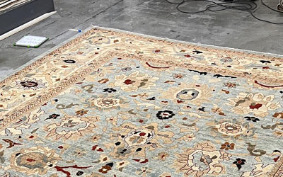 Yellow presian rug on the floor