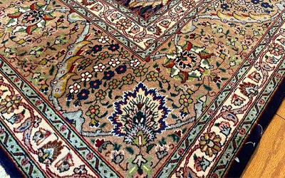 Beautiful alpona in persian rug